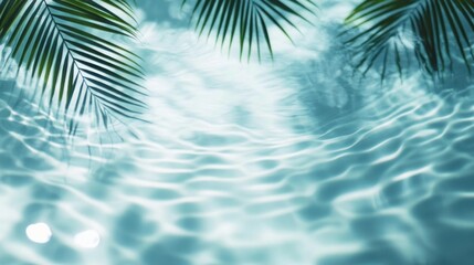 Sunlit clear water with gentle ripples and shadows of palm leaves creating a peaceful and tropical atmosphere