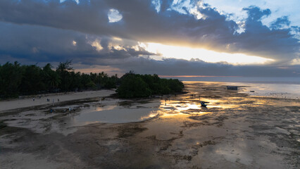 Walakiri's Beauty at Low Tide: A Stunning Panorama of Sand and Sunset