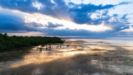 Walakiri's Beauty at Low Tide: A Stunning Panorama of Sand and Sunset