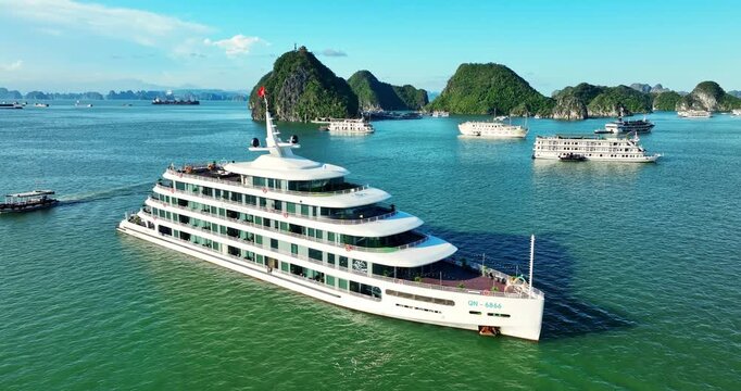 Aerial view of Scenic Halong Bay, Vietnam with boats, cruise among limestone islands. UNESCO World Heritage Site. Popular landmark, famous destination of Vietnam