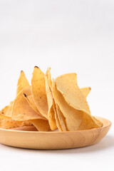 Tortilla chips made from baked corn for Mexican food snack on white background