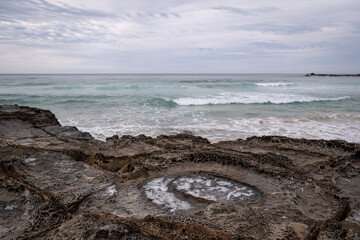 rock pool in headland at pretty beach