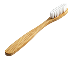 Natural bamboo toothbrush with white nylon bristles, an eco-friendly and biodegradable oral hygiene tool isolated on a white background