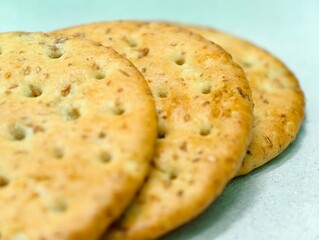 Macro View of Whole Grain Crackers with Seeds, Healthy Snack Background