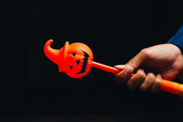 Bright Orange Halloween Wand with Pumpkin Face and Witch Hat, Perfect for Trick-or-Treat Events and Festive Celebrations