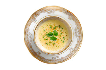 Top-down view of luxurious bowl of delicious creamy corn soup served in ceramic cups and plates isolated on cut out PNG or transparent background. Highlighting rich texture and gourmet presentation.