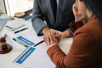Lawyer comforts his clients with legal advice and serious stress trust commitment for justice...