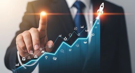 Business professional activating a growth graph with a rocket launch symbol