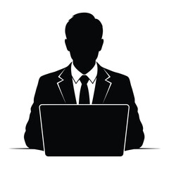 Silhouette of a businessman in a suit working on a laptop computer creating a professional business image concept. silhouette