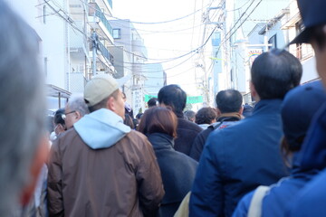 crowd of people in Japanese winter festival .  Kamimachi , Tokyo , Japan
