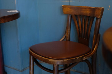 old wooden chair and table in cafeteria
