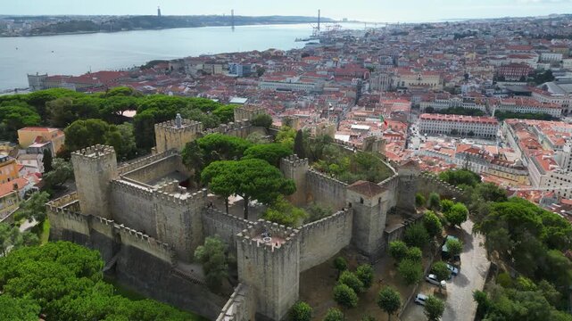Aerial view circling the S&atilde;o jorge Castle, sunny day in Lisbon city, Portugal