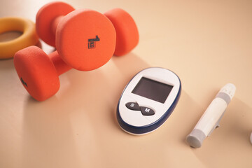 Workout gear and health devices on a gym surface