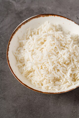 Simple bowl of steamed white rice, ideal side dish for Asian meals