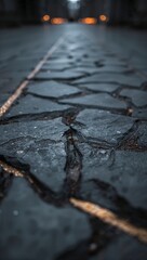 Fototapeta premium Cobblestone street perspective with blurred lights creating a moody urban atmosphere at night perfect for backgrounds and atmospheric visuals