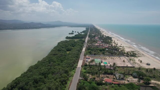 Aerial view of sandy strand between Caribbean Sea and Unare Lagoon in Venezuela