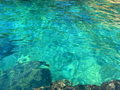 Mediterranean sea aqua blue teal water surface.