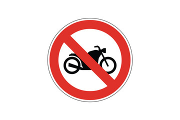 A circular red and white sign with a black motorcycle and a red diagonal line