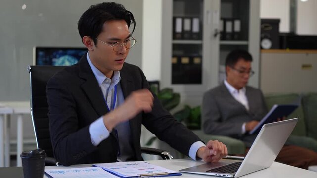 stressed businessman working in the office. Businessman thinking too much work concept in the office.