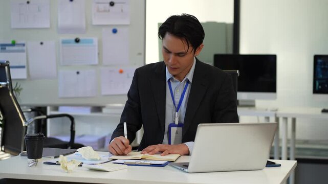 stressed businessman working in the office. Businessman thinking too much work concept in the office.