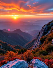 Dahong Mountain peaks, bathed in a colorful sunset, overlook the Suizhou landscape in China.