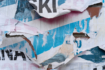 Torn and ripped street poster background, old paper texture