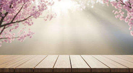 Empty wooden table with soft pink cherry blossoms and warm sunlight in the background, creating a serene and natural spring setting perfect for product display