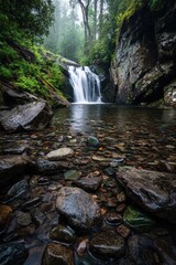Fototapeta premium Misty waterfall cascading into a tranquil pool surrounded by mossy rocks