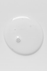 Transparent cosmetic product. Face serum or cleanser gel or body moisturizing gel.