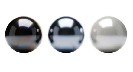 Three polished spheres in black, grey, and white isolated on transparent background