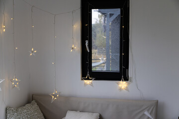 cozy bedroom detail and Christmas lights