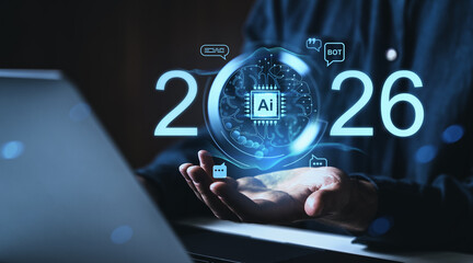 Futuristic AI concept with digital brain and 2026 glowing numbers over open hands in front of a laptop on dark background, symbolizing future technology online.