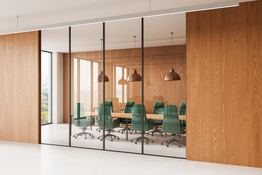 Modern conference room interior with green chairs, wooden walls, and glass partitions in a sleek office environment. 3D Rendering