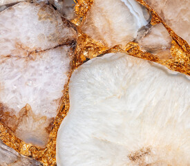 Agate Atena unique semi precious stone texture with a gold leaf.