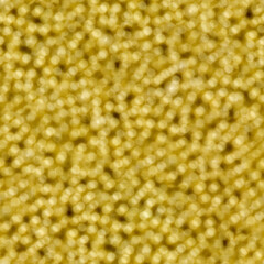 Yellow light bokeh. Seamless square texture.