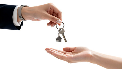 Handing over house keys symbolizes property ownership and new beginnings.