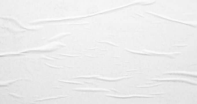 white crumpled and creased glued wrinkled paper poster texture background