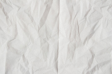Wrinkled white paper texture background close-up