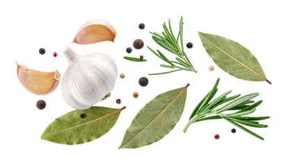 Garlic cloves, bay leaves, rosemary sprigs, and peppercorns scattered randomly on clean white background