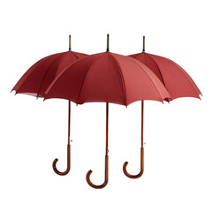 Three red brown umbrellas isolated on transparent background