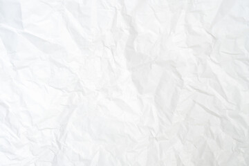 Top view and full frame of wrinkled or crumpled white paper texture used as crumpled white paper background texture in decorative art work