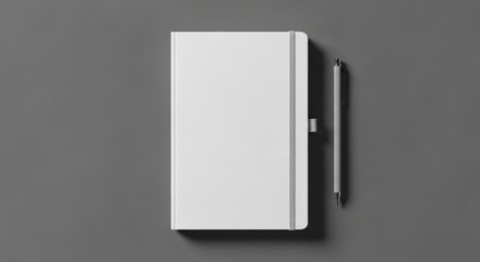 Minimalistic white notebook and black pen on grey background  