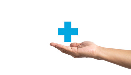 Fototapeta premium Hand holding a blue plus sign symbol, indicating healthcare or support