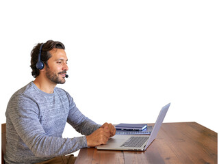 Smiling man works at desk with laptop and headphones on transparent background