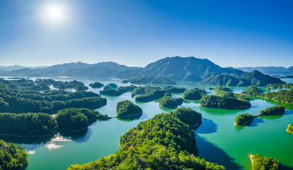 Aerial view of the beautiful lake and green islands with mountain natural landscape in the morning. Famous Qiandao Lake scenery in Hangzhou, China.
