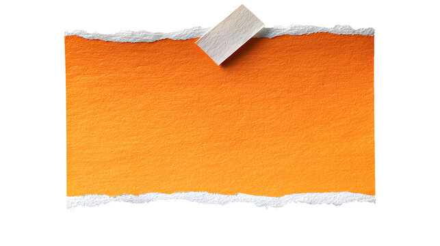 Orange sticky note with torn white tape on black background for creative design projects
