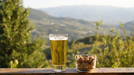 Pint of Beer and Peanuts Outdoors