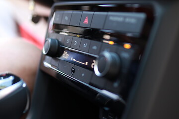 Fototapeta premium Close-Up of Car Climate Control Panel with Bokeh