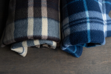 Warm plaids on the shelf