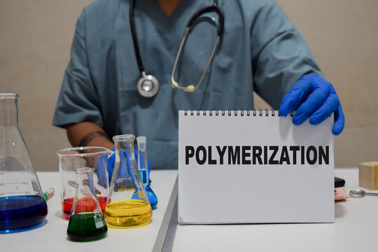 A healthcare professional explores and analyzes various polymerization processes in a lab. scientific research concept